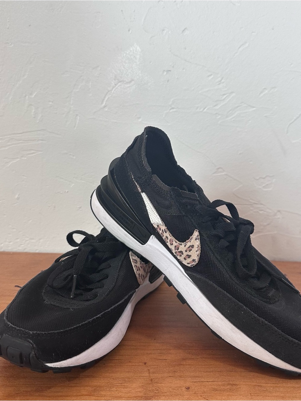 Nike Women's Black Sneakers with Leopard-Print Swoosh